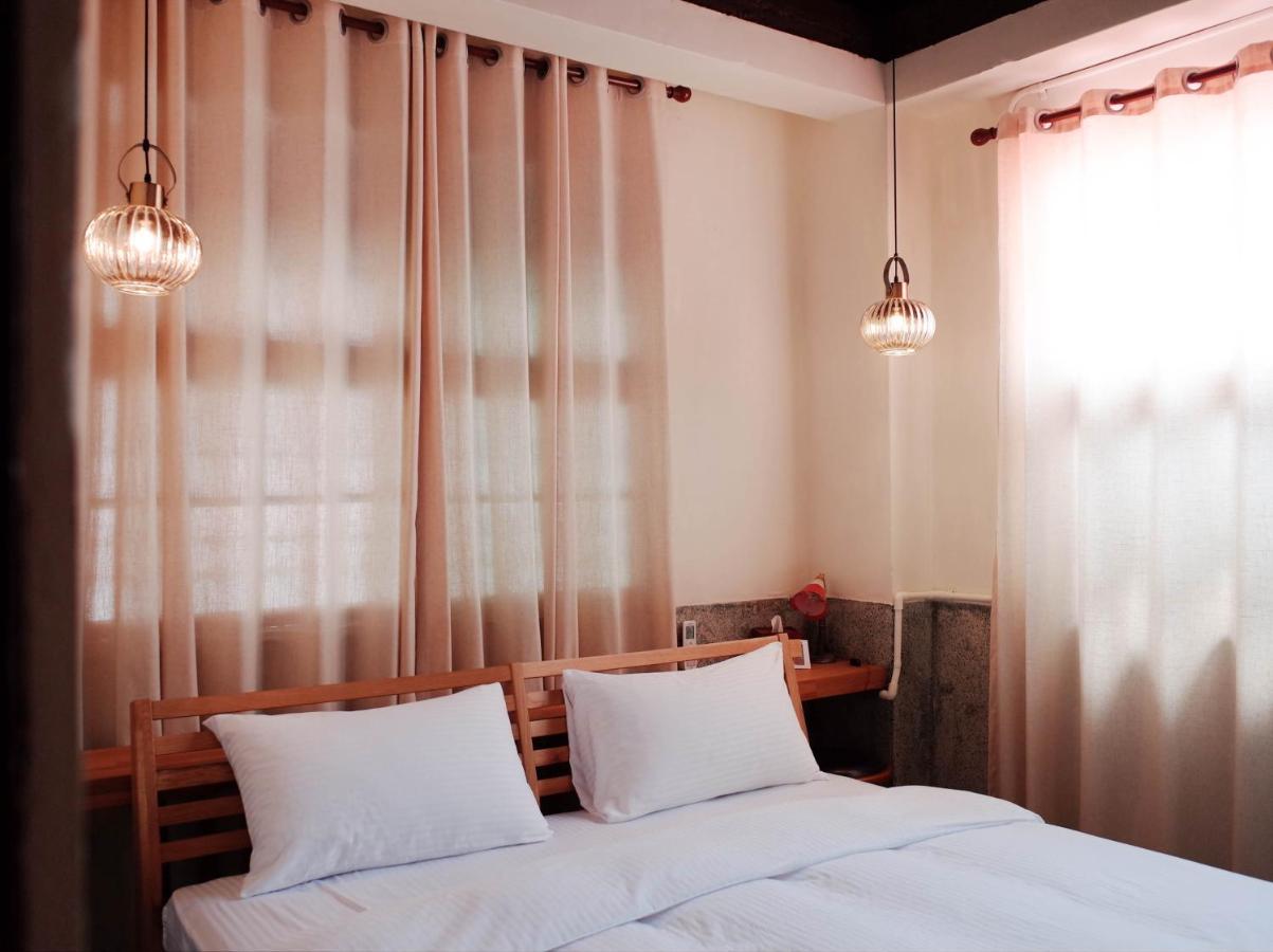 טאינאן Neat Hostel חדר תמונה