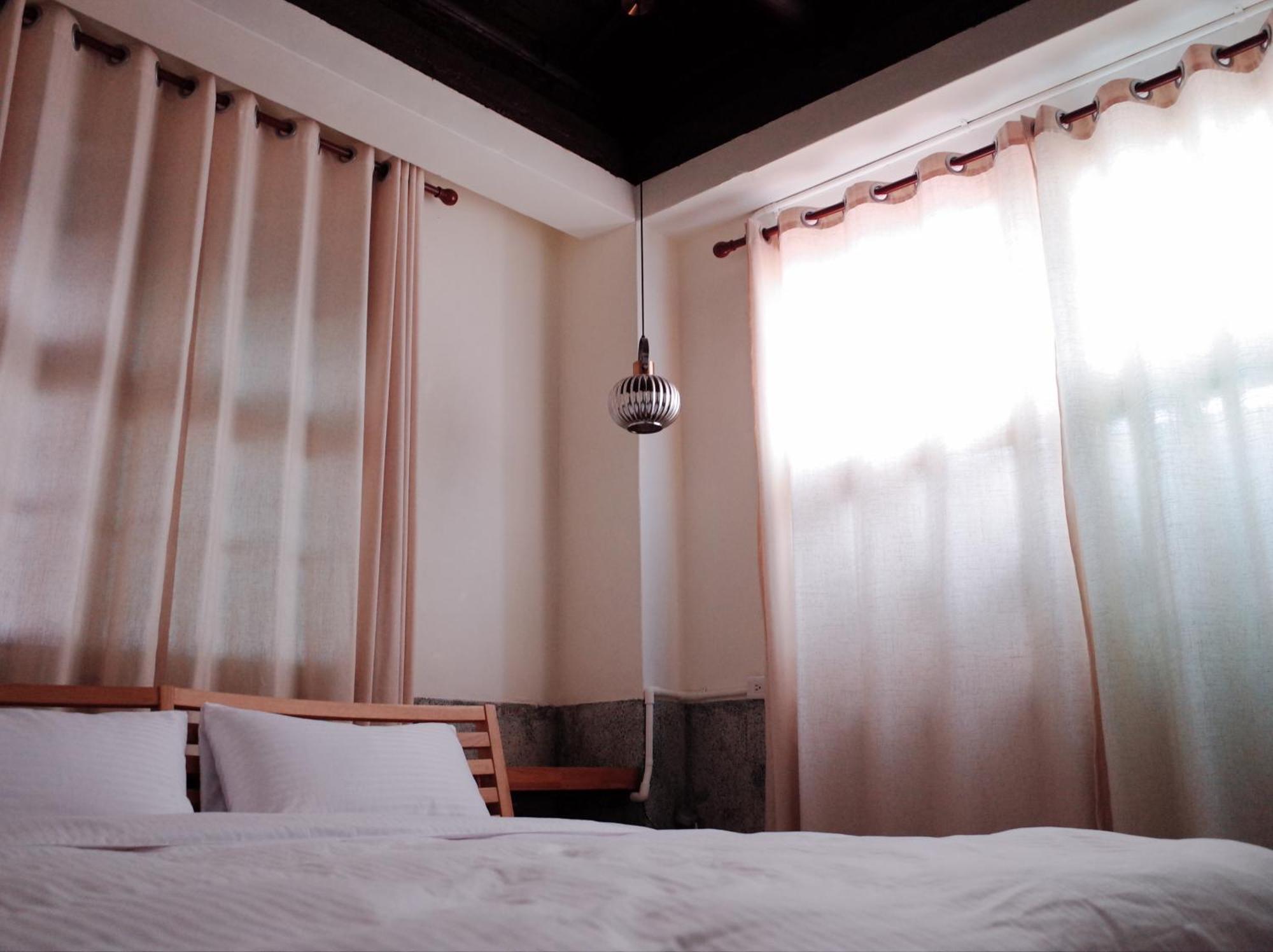 טאינאן Neat Hostel חדר תמונה