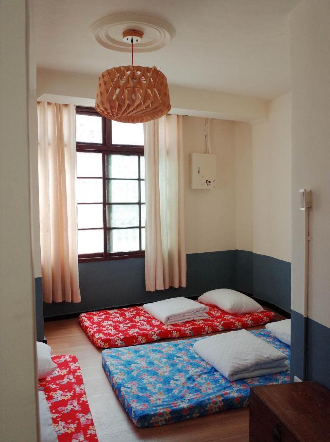 טאינאן Neat Hostel חדר תמונה